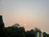 On a clear Wednesday morning, the sun rose orange in Putnam County through smoke from wildfires in Quebec.