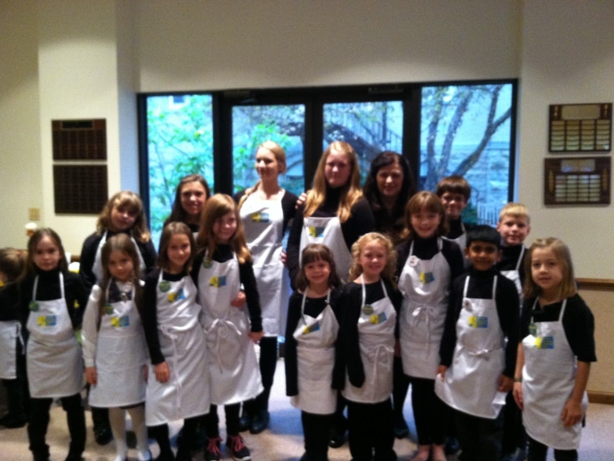 Choir members get ready to serve Swedish Meatballs