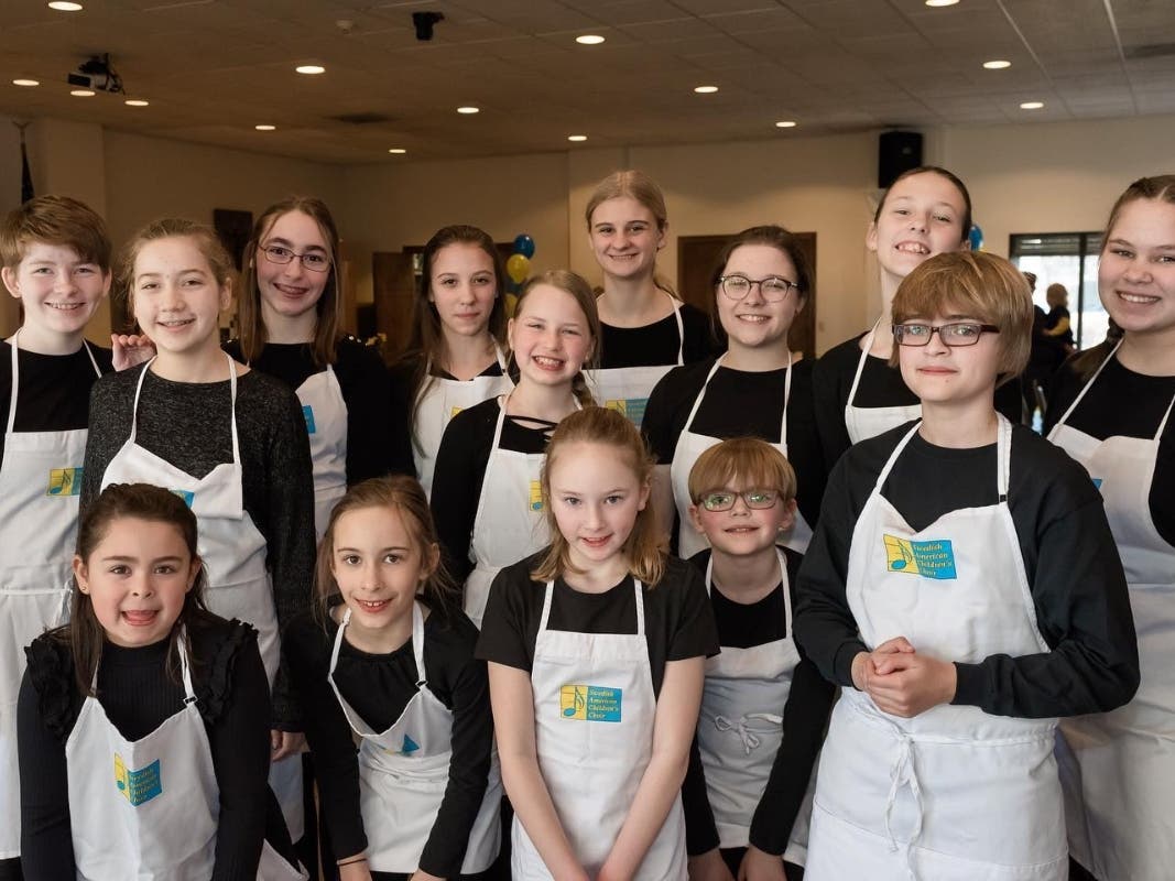 Swedish Choir members are servers for this event