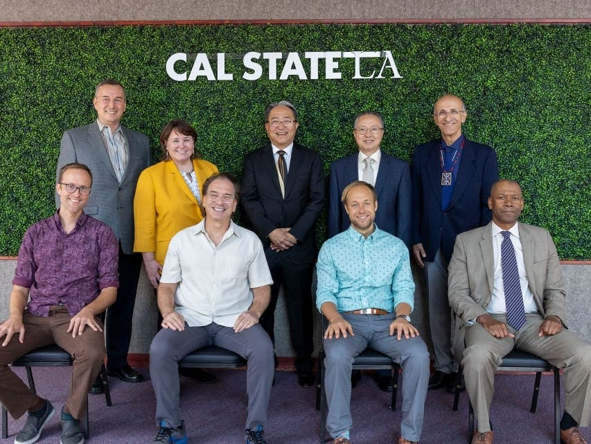 Outstanding faculty award winners with university leaders at Convocation 2023.