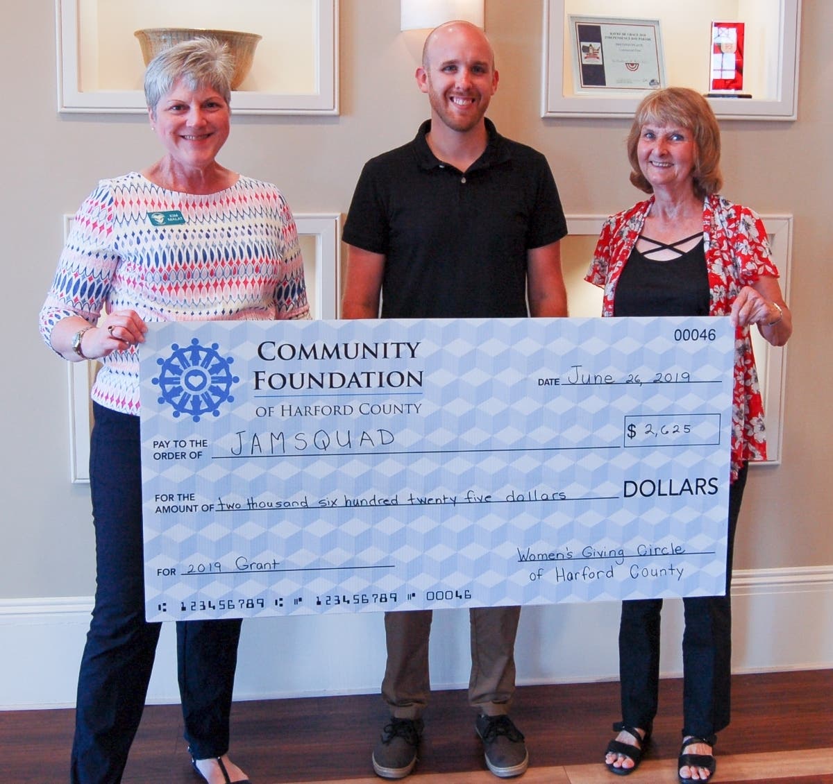 The Women's Giving Circle of Harford County presented JAMSQUAD a $2,625 grant for its One Community Two Wheels program. 