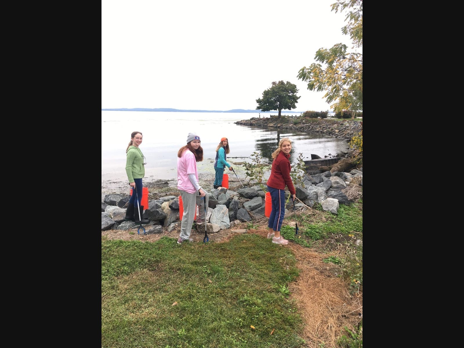 Volunteers Edie Benner, Katherine Weber, Faith Andreen and Ellianna Andreen participate in last year's River Sweep Reimgained by removing trash from the Promenade in Havre de Grace. 