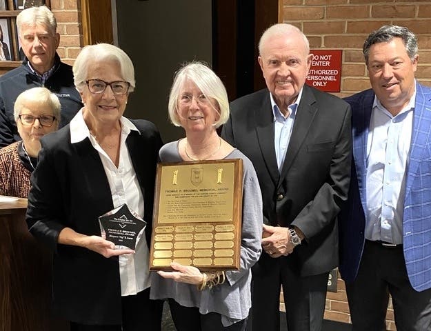 Margaret “Peg” Lucas, third from right, was presented the Thomas P. Broumel Memorial Award by The Greater Bel Air Community Foundation on October 16.