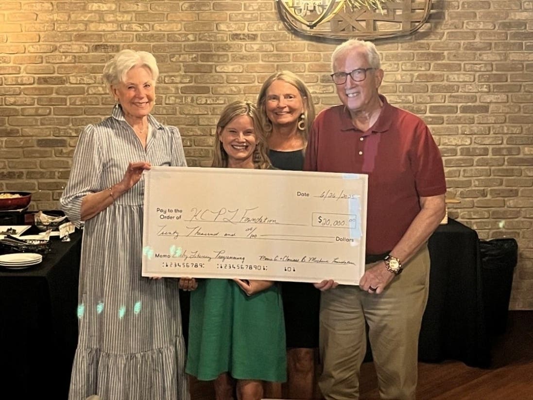 Carolyn Lambdin (left) and Joe Lambdin of the Mechanic Foundation present a donation of $20,000 in support of Harford County Public Library’s early literacy programming to the Library’s Amber C. Shrodes and Mary Hastler.