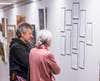 Gary and Randee Paller read the essays and poems that are part of the Woolsey fire exhibit, closing December 9.