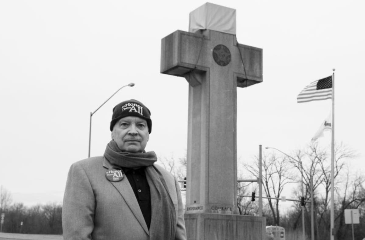 Steven Lowe stands near the Bladensburg Peace Cross, which he says violates the Constitution.