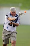 Maryland Speaker of the House Michael Busch takes the first shot on goal before a Chesapeake Bayhawks game in 2011.