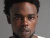 Dion Isom Sanders has been charged with weapons violations after a shooting at a pool party.