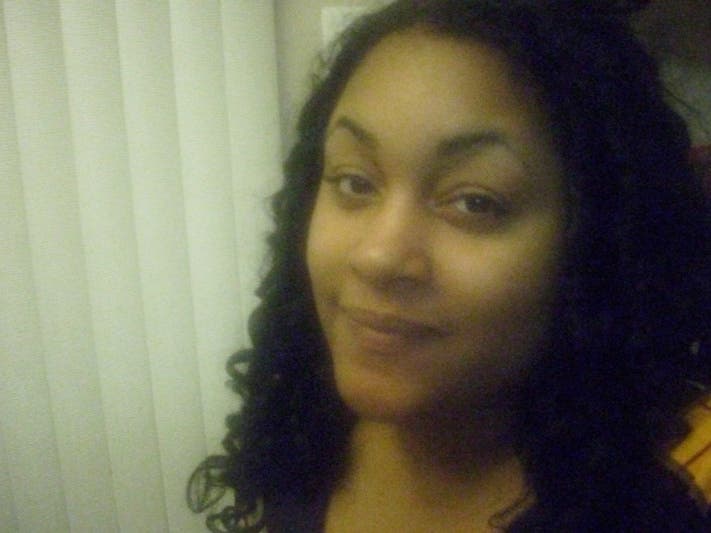 A New York woman accused of administering a fatal injection of silicone as a buttocks enhancement has been arraigned in the death of Kelly Mayhew of Prince George's County.