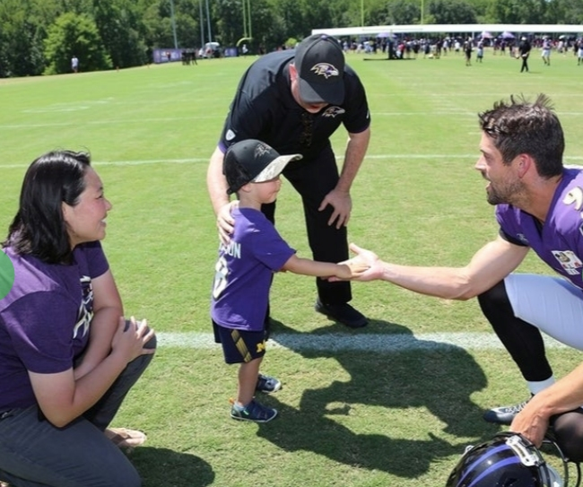 Gov. Larry Hogan's grandson, Cam, got a lesson in kicking the football from Baltimore Ravens star Justin Tucker.