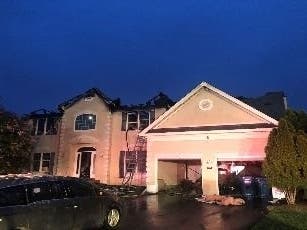 Improperly discarded ashes from a grill started a house fire in Ashburn that caused $750,000 damage, Loudoun County Fire officials said.