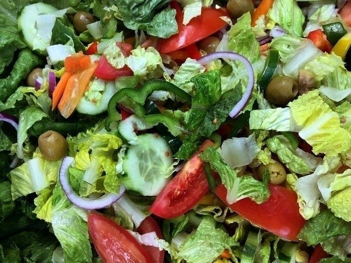 Nearly 100K pounds of salad, some of it distributed to Georgia retailers, has been recalled because it may be contaminated with E.coli.