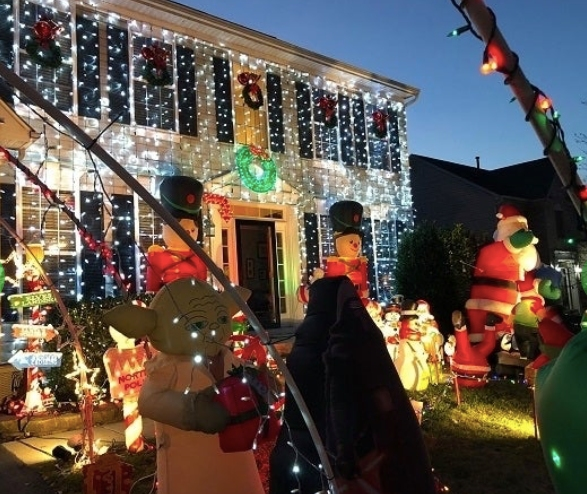 Mamulaville in Severn features 35 inflatables, nine plastic molds, 13 white reindeer, 1,100 feet of LED lights and four large arches spanning the driveway and more. 