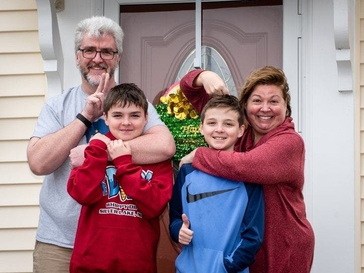 Photographer Jerry Frishman has been taking pictures of families on their front steps during the coronavirus pandemic. 