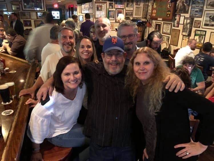 Colleagues and friends of a longtime Tampa Tribune editor, Janine Dorsey, (front left in white) are mourning her death in a crash. Dorsey and her partner, Peter Yore, were riding a tandem bike when they were hit by a vehicle. Both died at the scene.