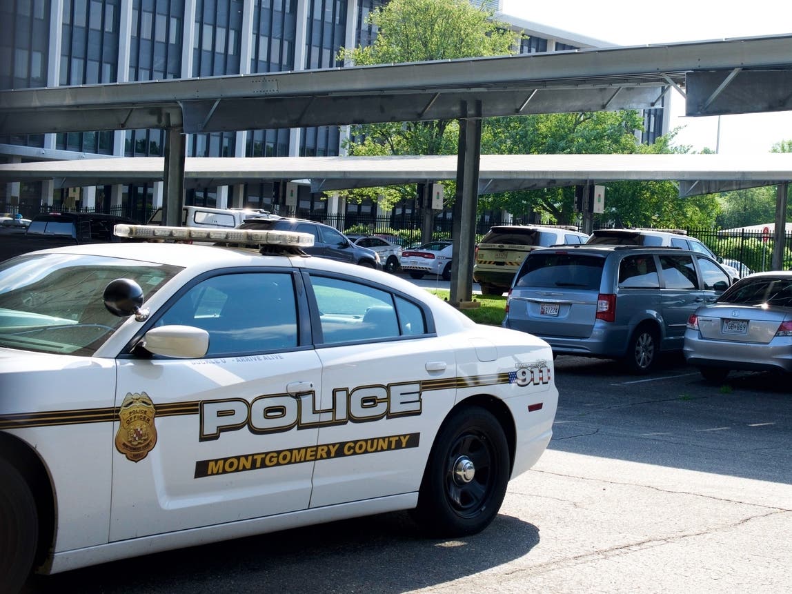 When Montgomery County Police went to the home of a man accused of fatally shooting a Dash In store worker in Silver Spring, they found a woman's decomposing body. The suspect has been charged with murder, and more charges are possible.