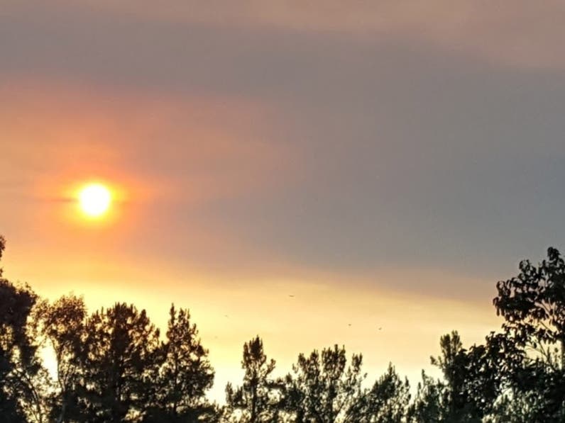 Hazy skies are producing vivid sunrises and sunsets in Maryland because of smoke from wildfires burning in Canada, say weather experts.