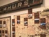 The Elmhurst train station sign from late 1800s was restored for the exhibit.