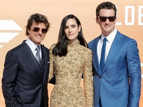 Tom Cruise (from left), Jennifer Connelly and Miles Teller attend the "Top Gun: Maverick" Global Premiere Red Carpet.