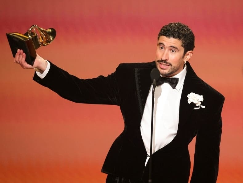 Bad Bunny accepts the Album of the Year award at the 68th Grammy Awards, becoming the first Latin artist to win the prize.
