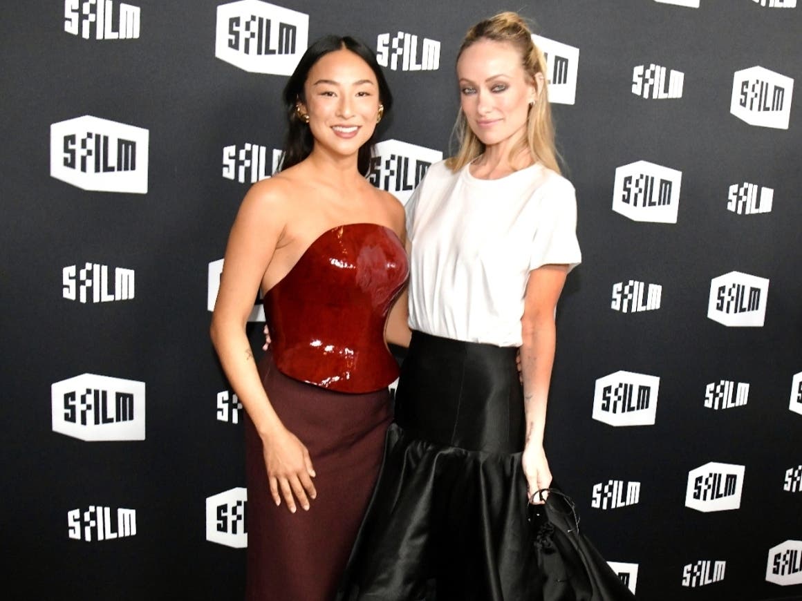 (L-R) Greta Lee and Olivia Wilde arrive at 2026 SFFILM Festival Opening Night at Swedish American Hall on April 24, 2026 in San Francisco, California. 
