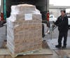 Toy delivery driver Juan Reyes unloads four pallets/2,600 lbs. of the anonymous donation of toys at the Treasure Chest Foundation’s Orland Park warehouse. The toys will help bring smiles of joy to 14,000 childhood cancer patients nationwide.