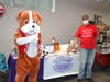 Toy Con Toy Shows mascot Retro the bulldog and Toy Con Toy Show co-founder Terry Mannix at the Toy Con Toy Show drive at the Bridgeview Community Center. 

