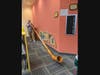 Last year this gentleman tried out the alphorn at the New Jersey Workshop for the Arts' Instrument Petting Zoo. Adults and children alike can try out their instruments this year, too.  
