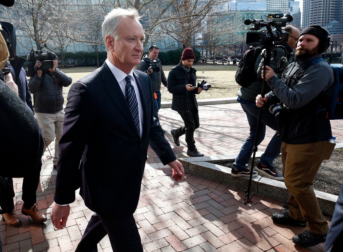Toby MacFarlane departs federal court in Boston after facing charges in a nationwide college admissions bribery scandal.