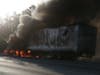 Crews were on the scene where a fully engulfed big rig fire has spread to the trees and brush alongside the 10 Freeway.