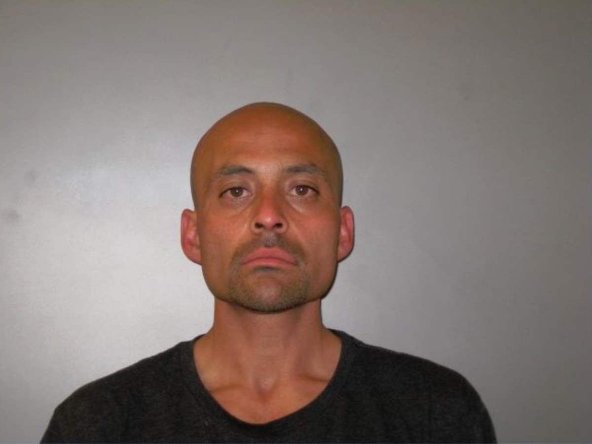 Firefighters contend with extreme heat and steep slopes in the Ranch 2 Fire in Azusa, while policed warn the public about Osmin Palencia, an arson suspect considered violent.