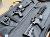 The LAPD arrested three people and confiscated guns and 662,809 counterfeit goods at a Downtown warehouse.