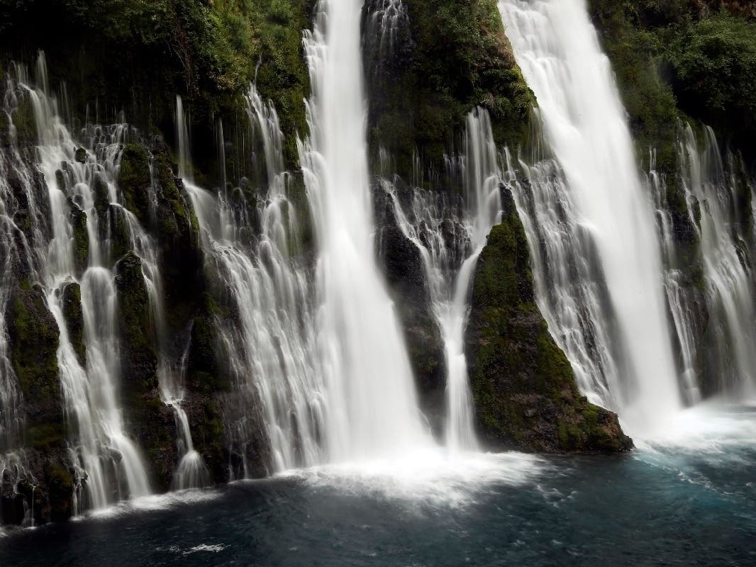 Water comes down from Barney Falls at McCarthy-Burney Falls Memorial Park on Tuesday, Aug. 5, 2014, in Burney, Calif.