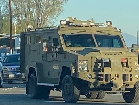A SWAT vehicle blocks traffic.