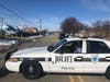 A large police presence remained Friday afternoon on Joliet's Republic Avenue.
