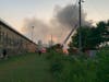 Firefighters fight a blaze near the Old Joliet Prison.