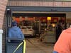 A vehicle can be seen inside the Food 4 Less store on Tuesday afternoon.
