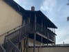 This apartment building in the 100 block of McDonough Street, near the McDonough Street Bridge, went up in flames early Thursday morning. 