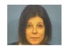 Julie Mazzocchi, 54, of Bloomingdale, was charged with three counts of impersonating an officer and intimidation, police said. 