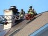 Crews battle a fire at a funeral home on Black Road on Tuesday.