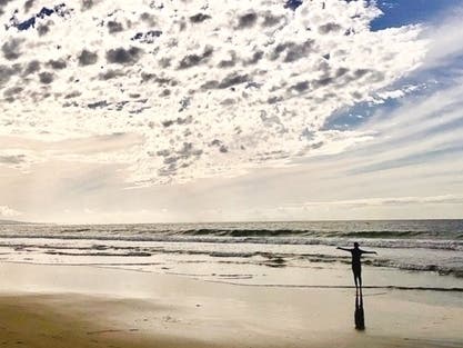 Clouds pass over the beach in Santa Monica. 