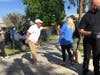 Los Angeles City Councilman Herb Wesson, a candidate for the Los Angeles County Board of Supervisors, and Albert Vera, a city council candidate in Culver City, pass out food in Culver City.