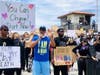 Hundreds protested in Manhattan Beach Tuesday. 