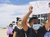 Hundreds protested in Manhattan Beach Tuesday. 