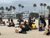 Thousands protest in Venice and Santa Monica along the beach.