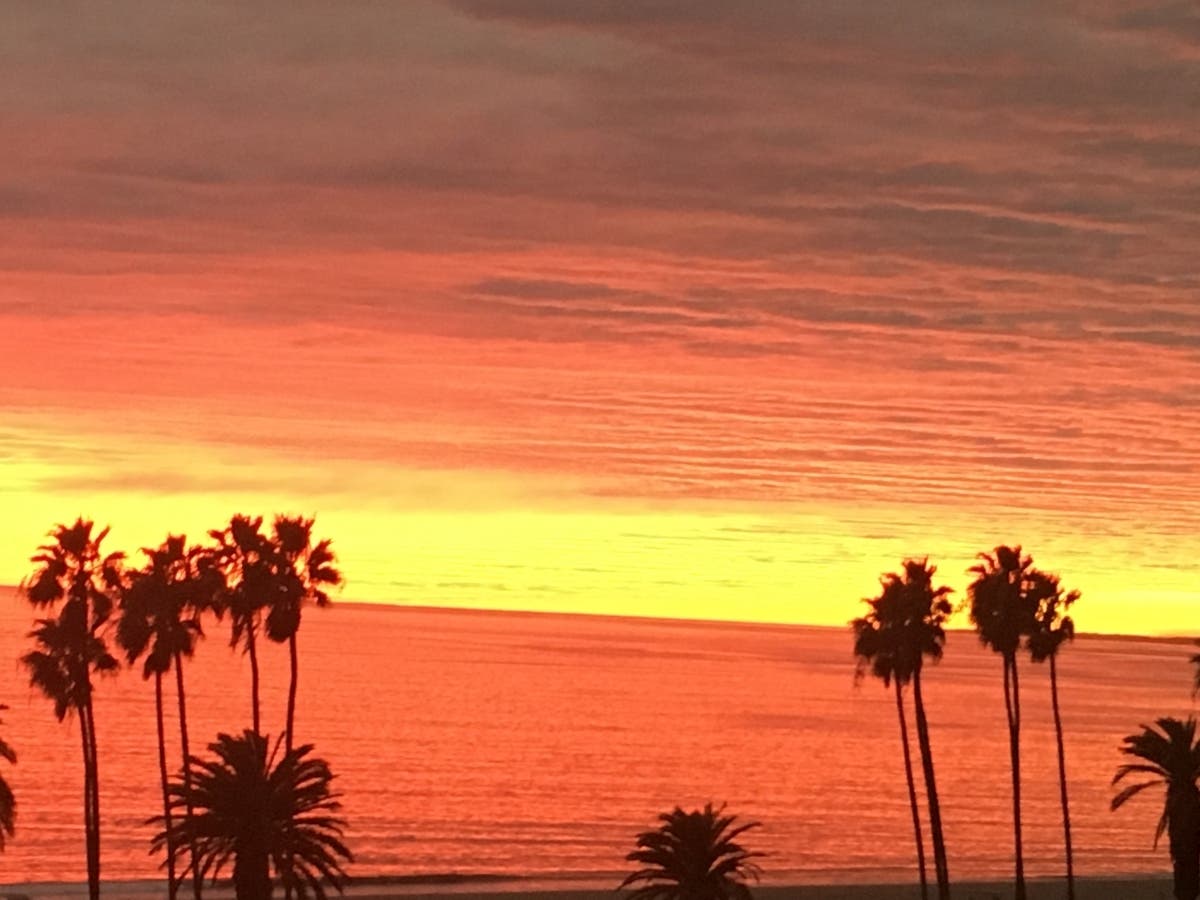 A gorgeous sunset lights up the sky in Santa Monica. 