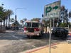 Firefighters responded to a crash in Santa Monica Wednesday next to a protest outside Santa Monica Police Department headquarters.