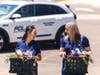 Wendy Hauffen (left), Desiree Bergman deliver flowers