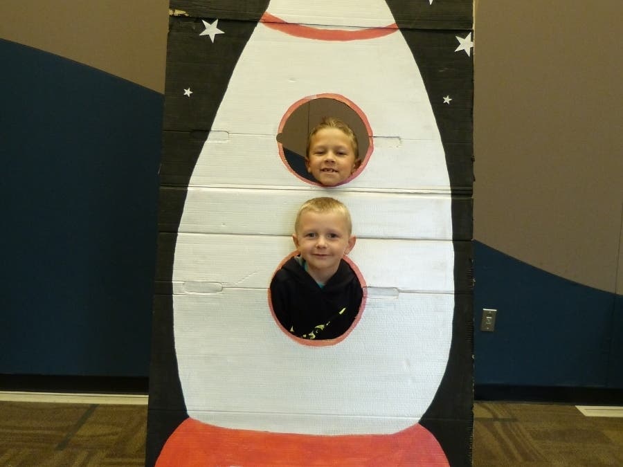 Kids getting their picture taken in the Canton Library's Lunar Lander!  (Parents welcome for pictures too!)