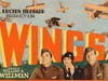 A lobby card for Wings